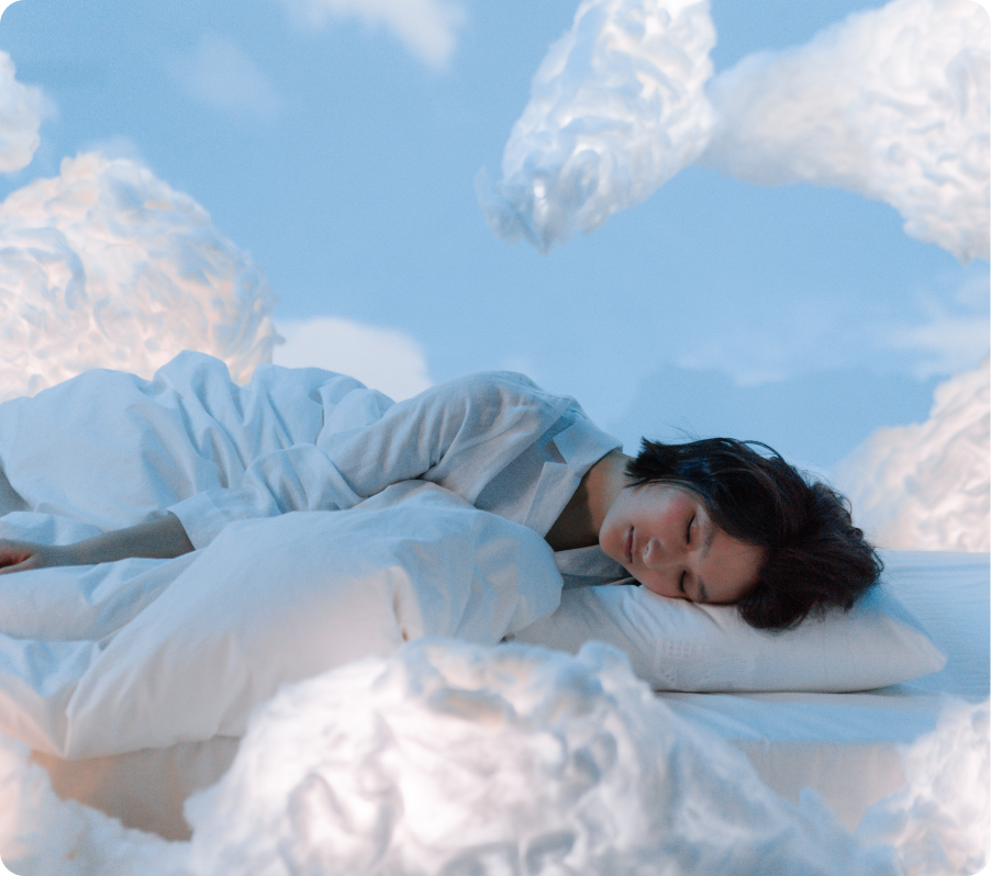 Woman sleeping in the clouds